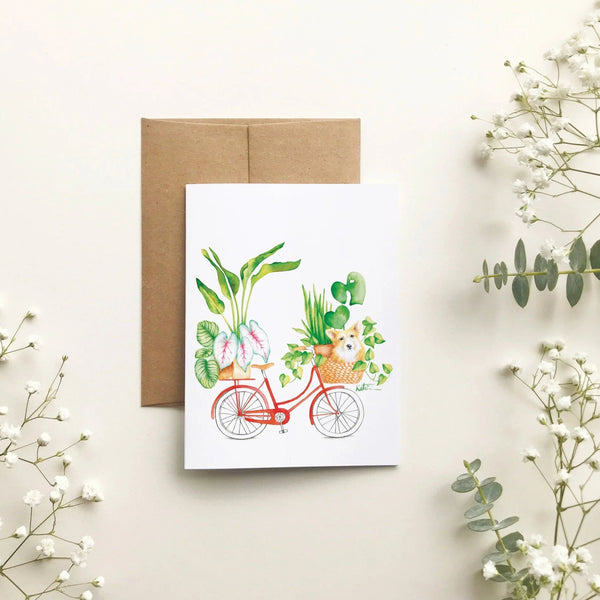Carte de souhait - Corgi et ses plantes à vélo par Katrinn Pelletier Illustration - Marie fil