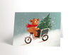 Carte de Noël ourson qui transporte un sapin de Noël à vélo - Valérie Boivin Illustrations